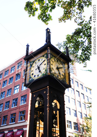 Vancouver steam clock and cityscape Vancouver steam clock and cityscape 41680355