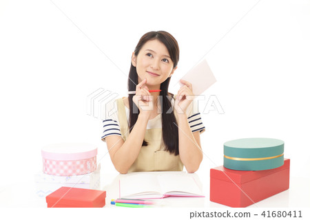 Woman writing a letter 41680411