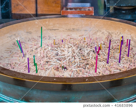 Religious incense sticks at a Japanese Temple Religious incense sticks at a Japanese Temple 41683896