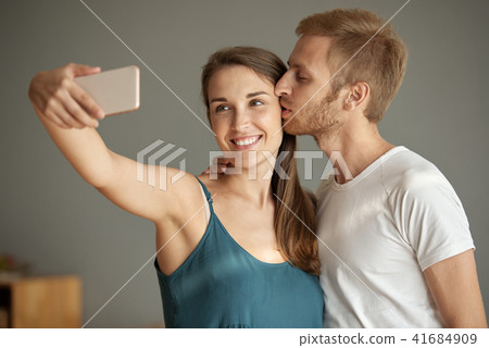 Taking romantic selfie Taking romantic selfie 41684909