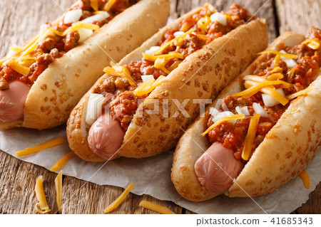 Authentic chili hot dog with cheddar cheese 41685343