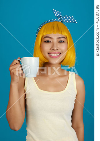 Happy coffee drinker 41687398