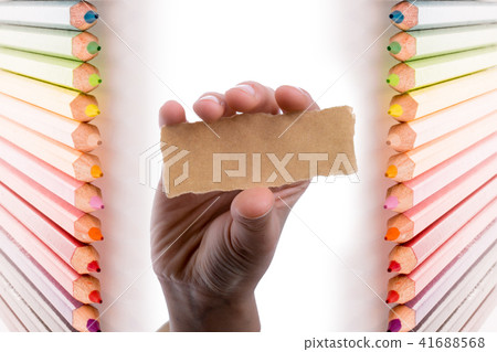 blank torn notepaper in hand 41688568