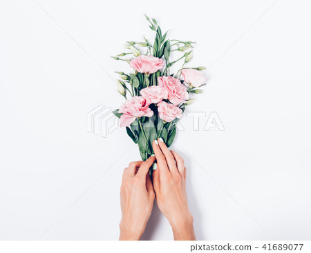 Florist making a bouquet of beautiful blooming Florist making a bouquet of beautiful blooming 41689077