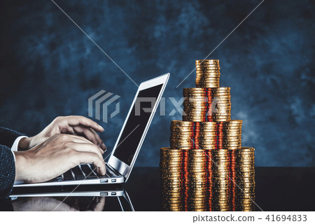 Mountain of laptop computer and money Mountain of laptop computer and money 41694833