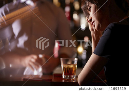 Women drinking in a bar Women drinking in a bar 41695819