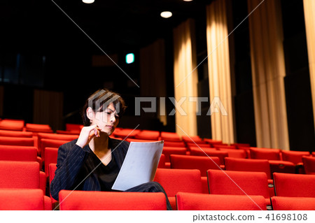 Men in the audience seats Men in the audience seats 41698108