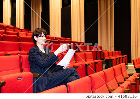 Men in the audience seats 41698110