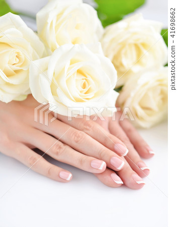 Hands of a woman with beautiful french manicure 41698662