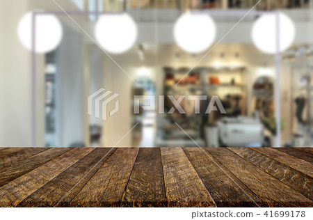 Selected focus empty brown wooden table and Coffee shop or resta 41699178