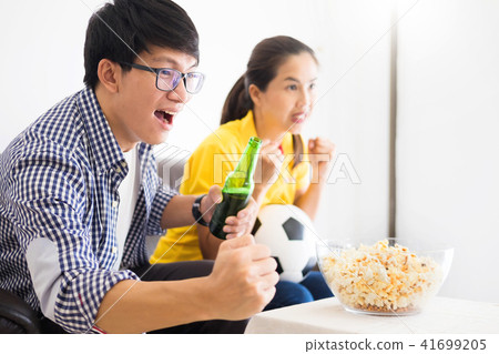 friendship, sports and entertainment concept - happy male friend 41699205