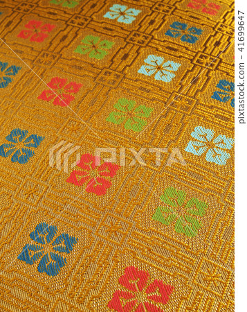 Woven fabric with a working pattern (Hanabishi) woven with gold 41699647
