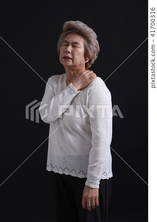 Asian woman facial expression, senior, middle aged, old, grandmother, close up, pain, illness, sadness, suffering, healthy 41700316