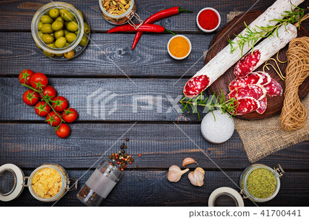 Sliced cured sausage, meat with spices. Sliced cured sausage, meat with spices. 41700441