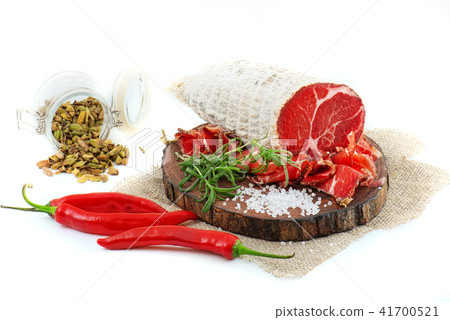 Sliced cured sausage, meat with spices. Sliced cured sausage, meat with spices. 41700521