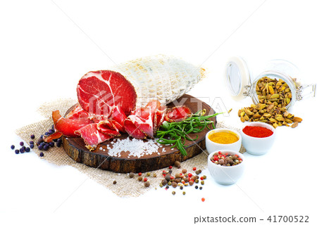 Sliced cured sausage, meat with spices. Sliced cured sausage, meat with spices. 41700522