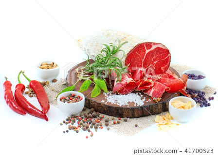 Sliced cured sausage, meat with spices. Sliced cured sausage, meat with spices. 41700523