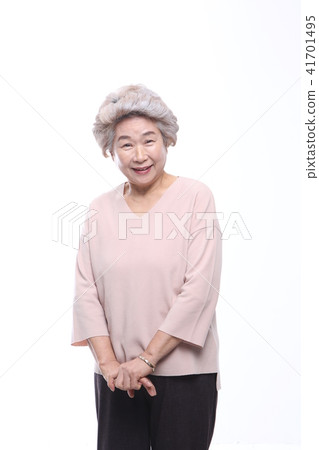 Asian woman's facial expression, senior, middle-aged, elderly, grandmother, close-up, laughing, happiness, emotion, health 41701495