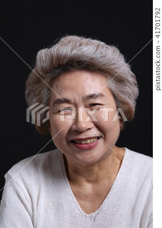Asian woman's facial expression, senior, middle-aged, elderly, grandmother, close-up, laughing, happiness, emotion, health Asian woman's facial expression, senior, middle-aged, elderly, grandmother, close-up, laughing, happiness, emotion, health 41701792