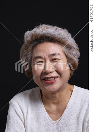 Asian woman's facial expression, senior, middle-aged, elderly, grandmother, close-up, laughing, happiness, emotion, health Asian woman's facial expression, senior, middle-aged, elderly, grandmother, close-up, laughing, happiness, emotion, health 41701798