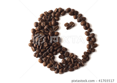 The symbol of Yin Yan is made up of coffee beans 41703517