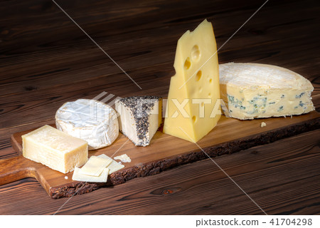 various types of cheeses on wooden table, Italian 41704298