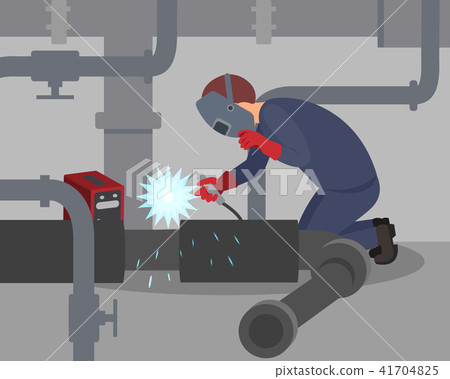 Worker welds large metal pipes at basement. Professional welder at work. Man in protective mask and Worker welds large metal pipes at basement. Professional welder at work. Man in protective mask and 41704825