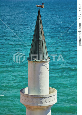 Minaret against the Sea Background Minaret against the Sea Background 41705508