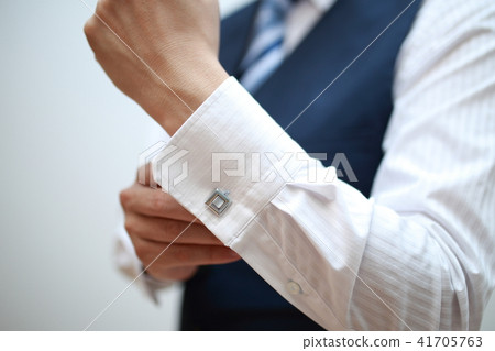 Cufflinks button (body parts no face person office worker shirt shirt title president copy space hands) 41705763