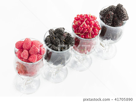 Raspberry, a big black blackberry and red currant Raspberry, a big black blackberry and red currant 41705890