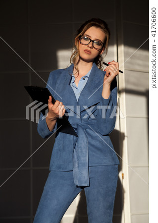 business woman in business attire in the negotiations business woman in business attire in the negotiations 41706600