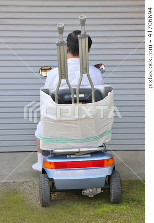 Silver Male Senior Car Crutch Backwards Silver Male Senior Car Crutch Backwards 41706694