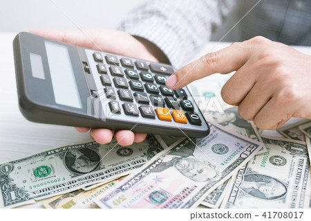 close up businessman hand using a calculator close up businessman hand using a calculator 41708017