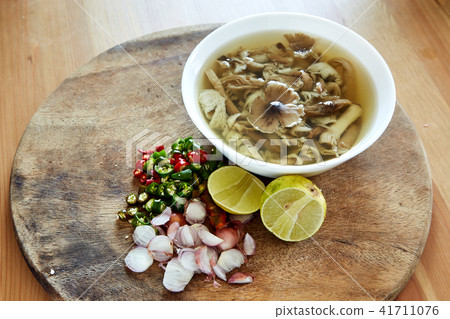 Spicy mushroom soup with Thai herbs 41711076