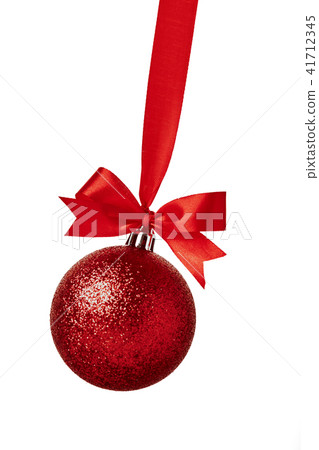 Red christmas ball with red bow over white Red christmas ball with red bow over white 41712345
