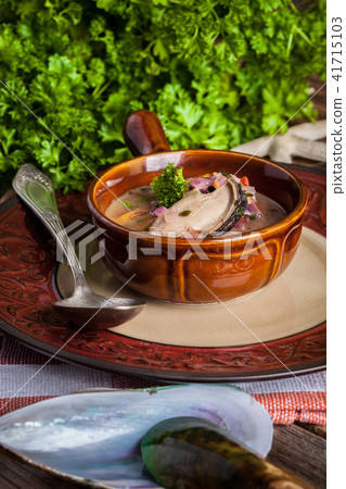 Cooked mussels in tomato sauce. Cooked mussels in tomato sauce. 41715103