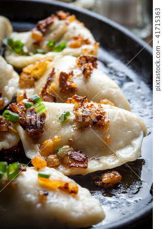 Dumplings with meat, onion and bacon. Dumplings with meat, onion and bacon. 41715363