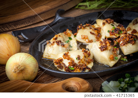 Dumplings with meat, onion and bacon. Dumplings with meat, onion and bacon. 41715365