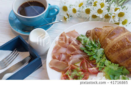 Croissant and meat on the rustic background 41716865