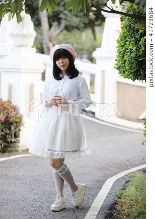 portrait asian woman lolita dress on nature park portrait asian woman lolita dress on nature park 41723684