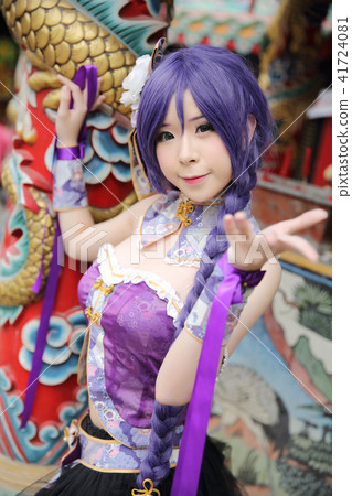 Portrait of asian young woman with purple Chinese dress cosplay with temple 41724081
