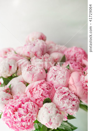 Beautiful bouquet of pink peonies . Floral composition, daylight. Wallpaper. Lovely flowers in glass 41729064