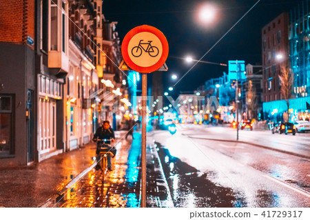 Bicycle lane sign on a night street Bicycle lane sign on a night street 41729317