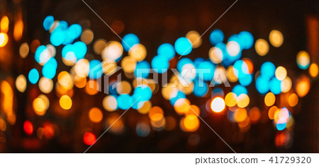 City night light blur bokeh, defocused background. City night light blur bokeh, defocused background. 41729320