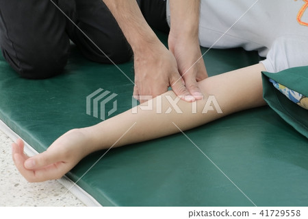 Deep tissue massage on arm closeup Deep tissue massage on arm closeup 41729558