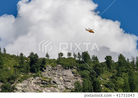 Rescue Helicopter in Italian Alps 41731043