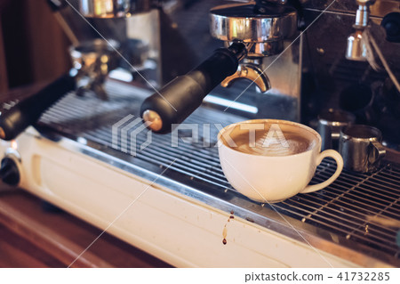 Hot Latte coffee leaf shape on coffee maker Hot Latte coffee leaf shape on coffee maker 41732285