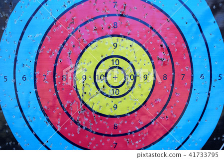 Archery target close up with many arrow holes 41733795