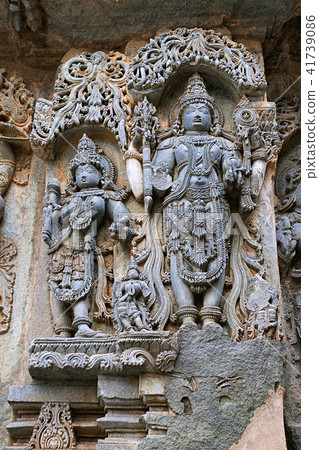 Ornate wall panel reliefs, Kedareshwara temple 41739086