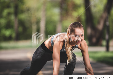 Delighted lady is spending day actively outdoors 41743007